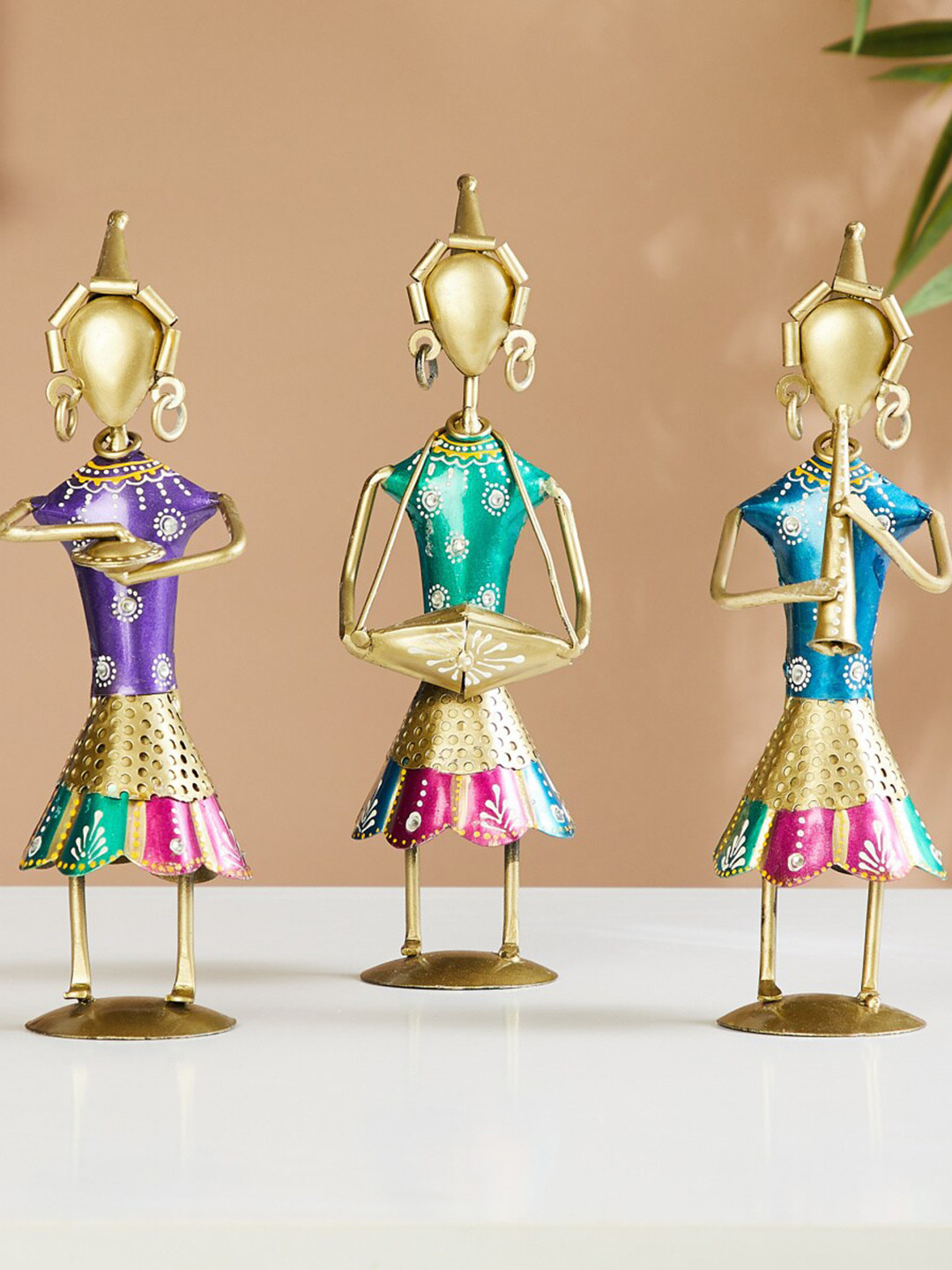 

Home Centre Purple & Beige 3-Pieces Musicians Figurines Showpieces