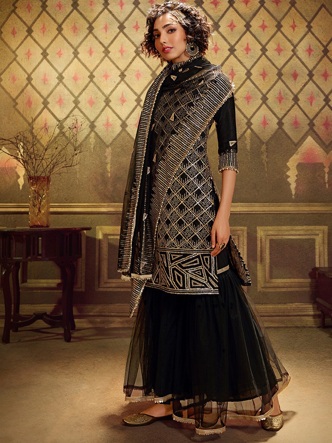 

ODETTE Ethnic Motifs Embroidered Sequinned Semi Stitched Kurta with Sharara & Dupatta, Black