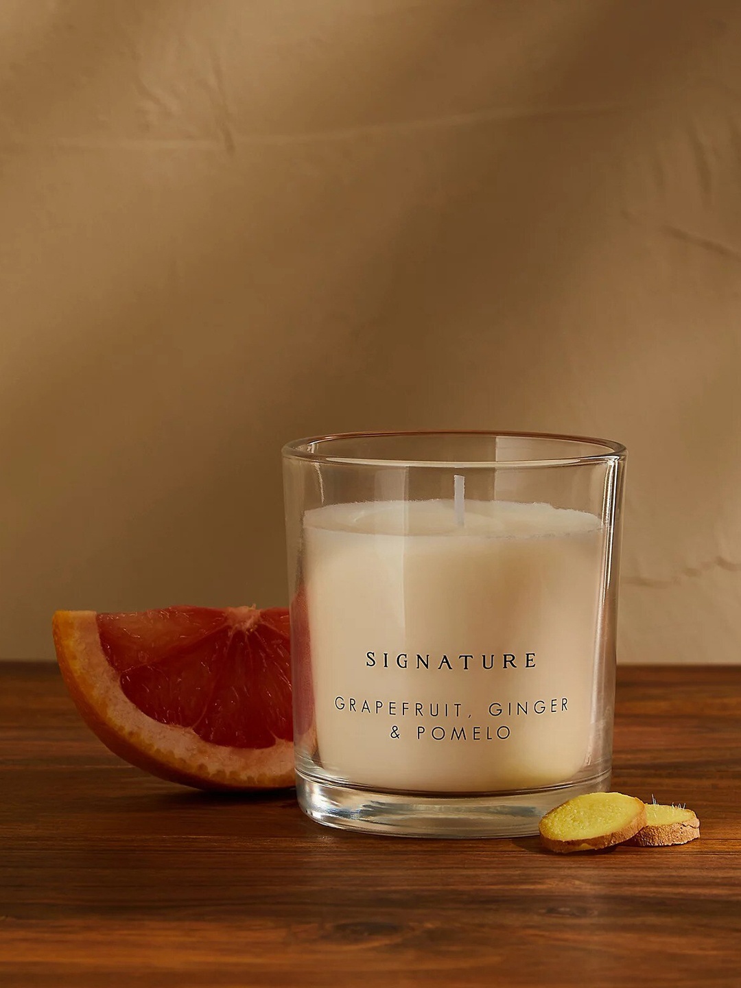 

Marks & Spencer Yellow Glass Scented Candle