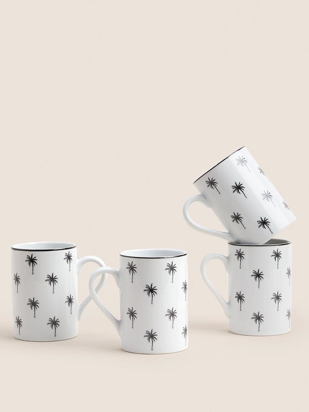 

Marks & Spencer White & Black 4 Pieces Printed Porcelain Glossy Mugs - 250 ML Each