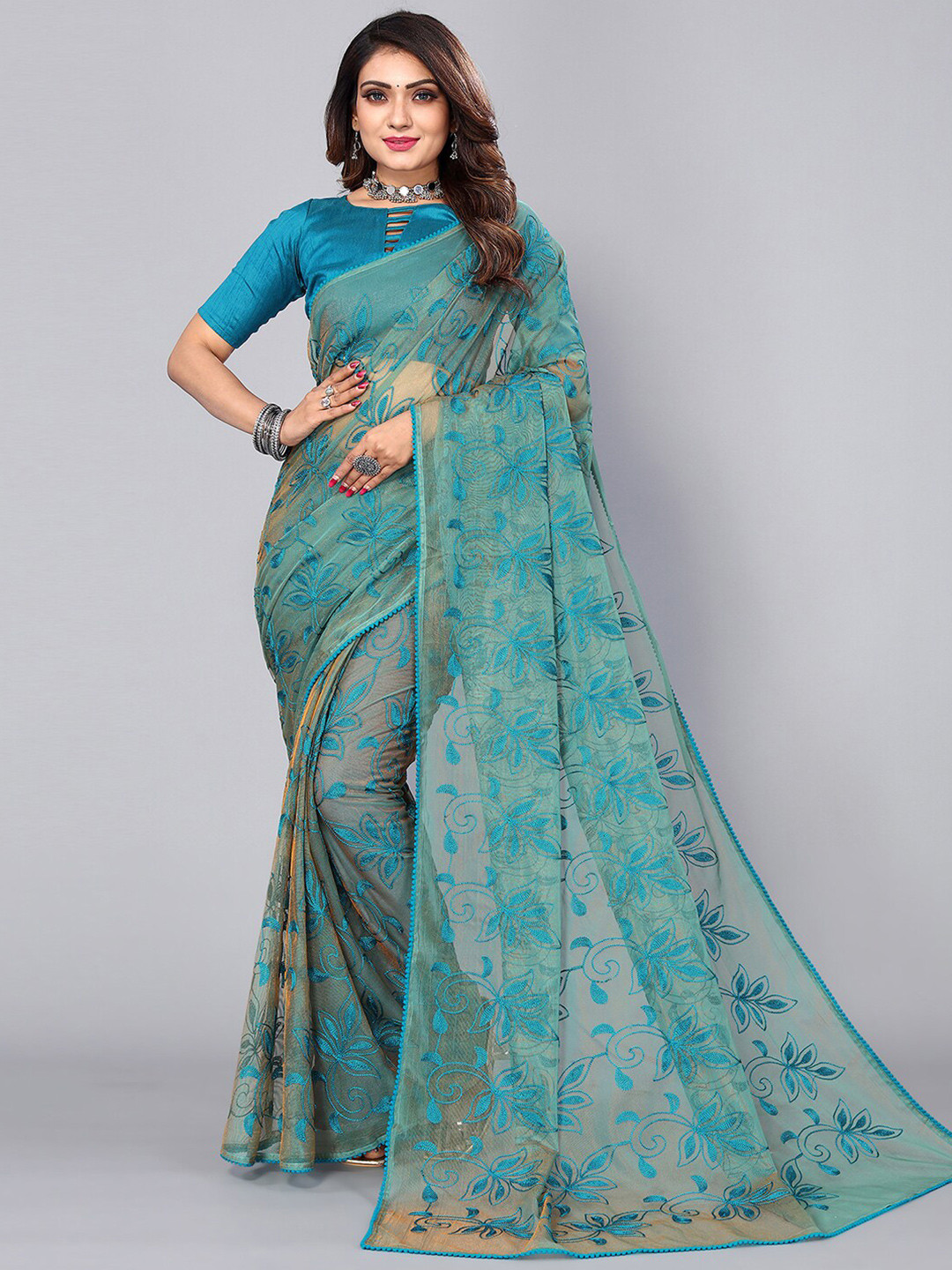 

Mitera Blue Floral Embroidered Net Saree