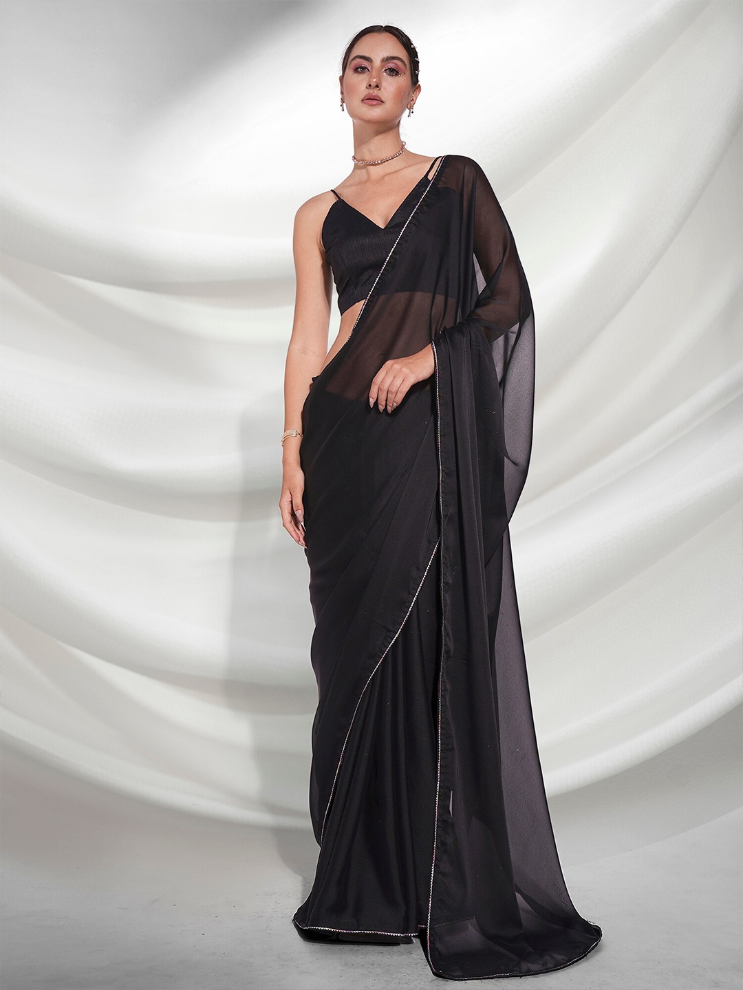 

Kalista Black & Gold-Toned Embellished Pure Georgette Saree