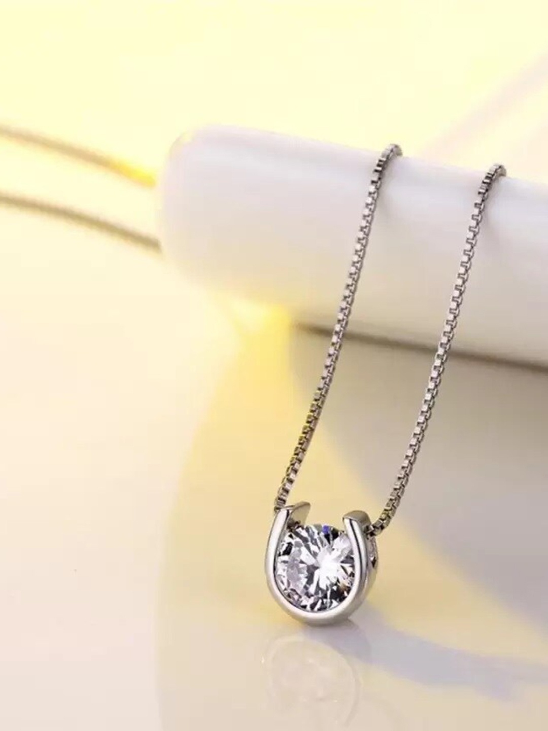 

MYKI Silver-Plated CZ Studded Horseshoe Shaped Pendant With Chain