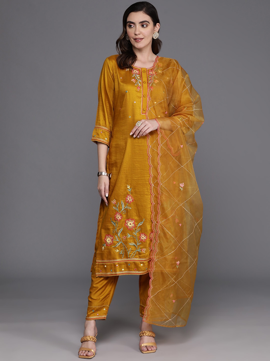 

Indo Era Women Floral Embroidered Regular Mirror Work Kurta with Trousers & With Dupatta, Mustard