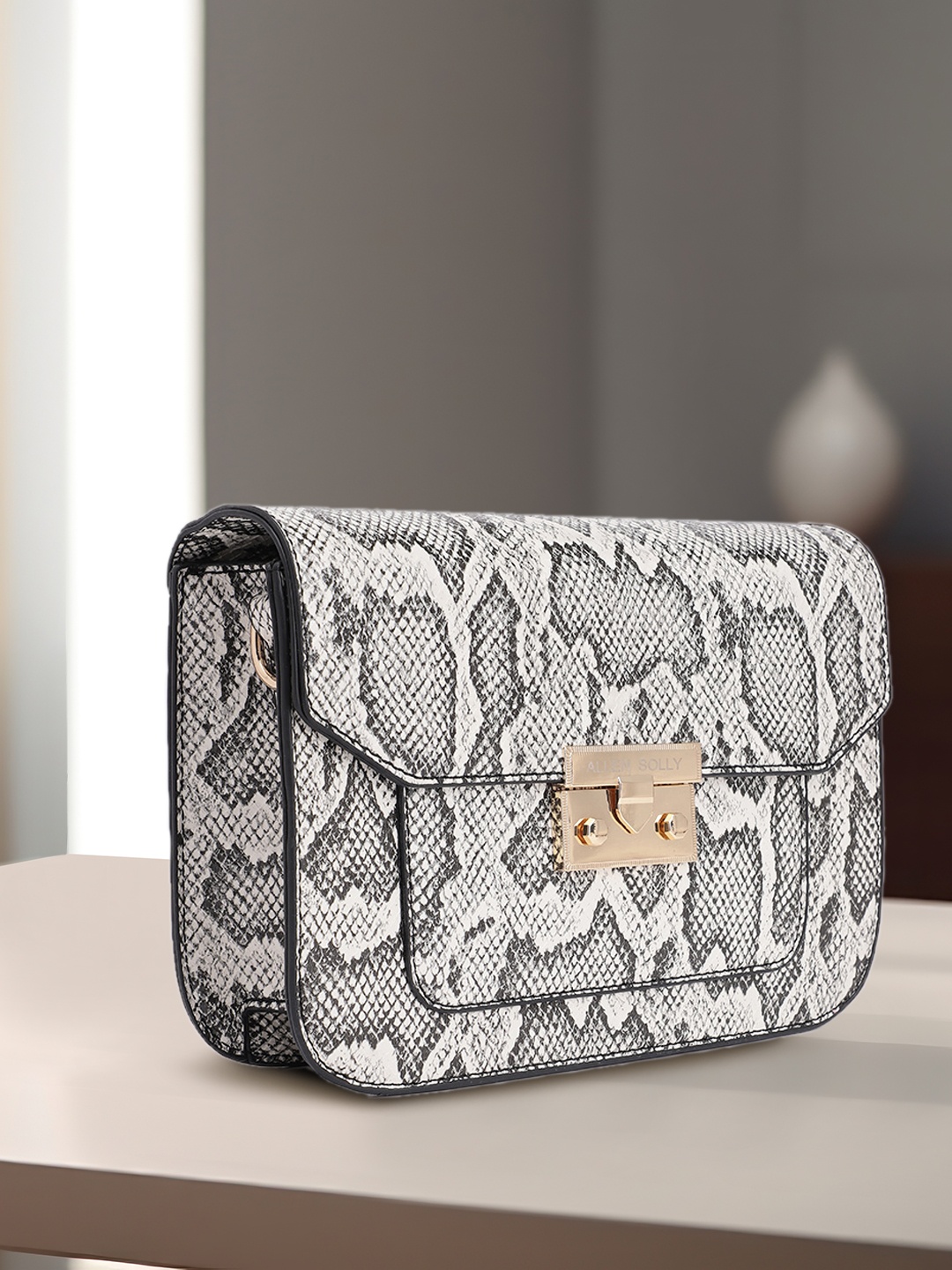 

Allen Solly Animal Print Sling Bag, Black