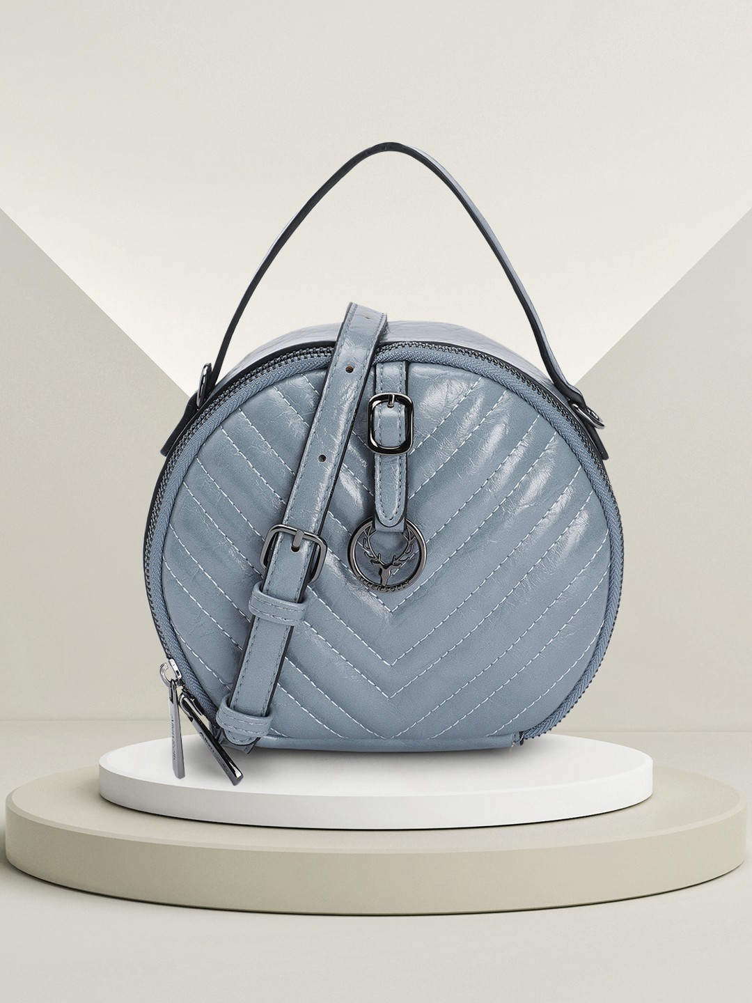 

Allen Solly Women Quilted Sling Bag, Blue
