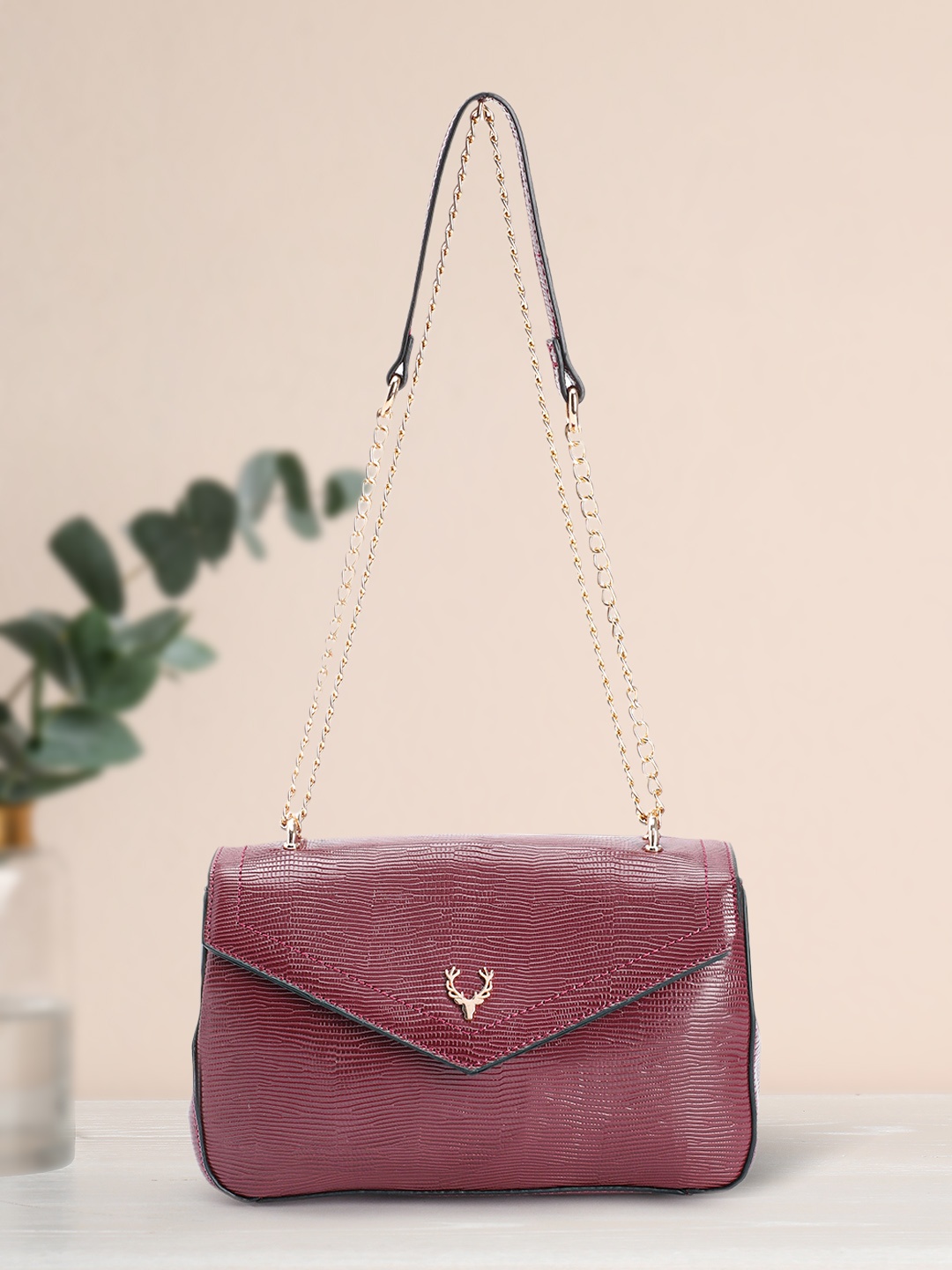 

Allen Solly Snake Skin Textured Sling Bag, Burgundy