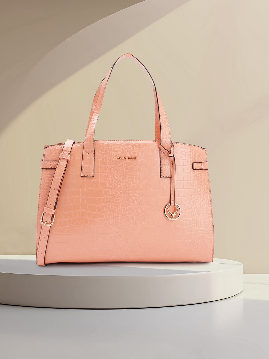 

Allen Solly Crocodile Textured PU Structured Laptop Handheld Bag with Tasselled Detail, Peach