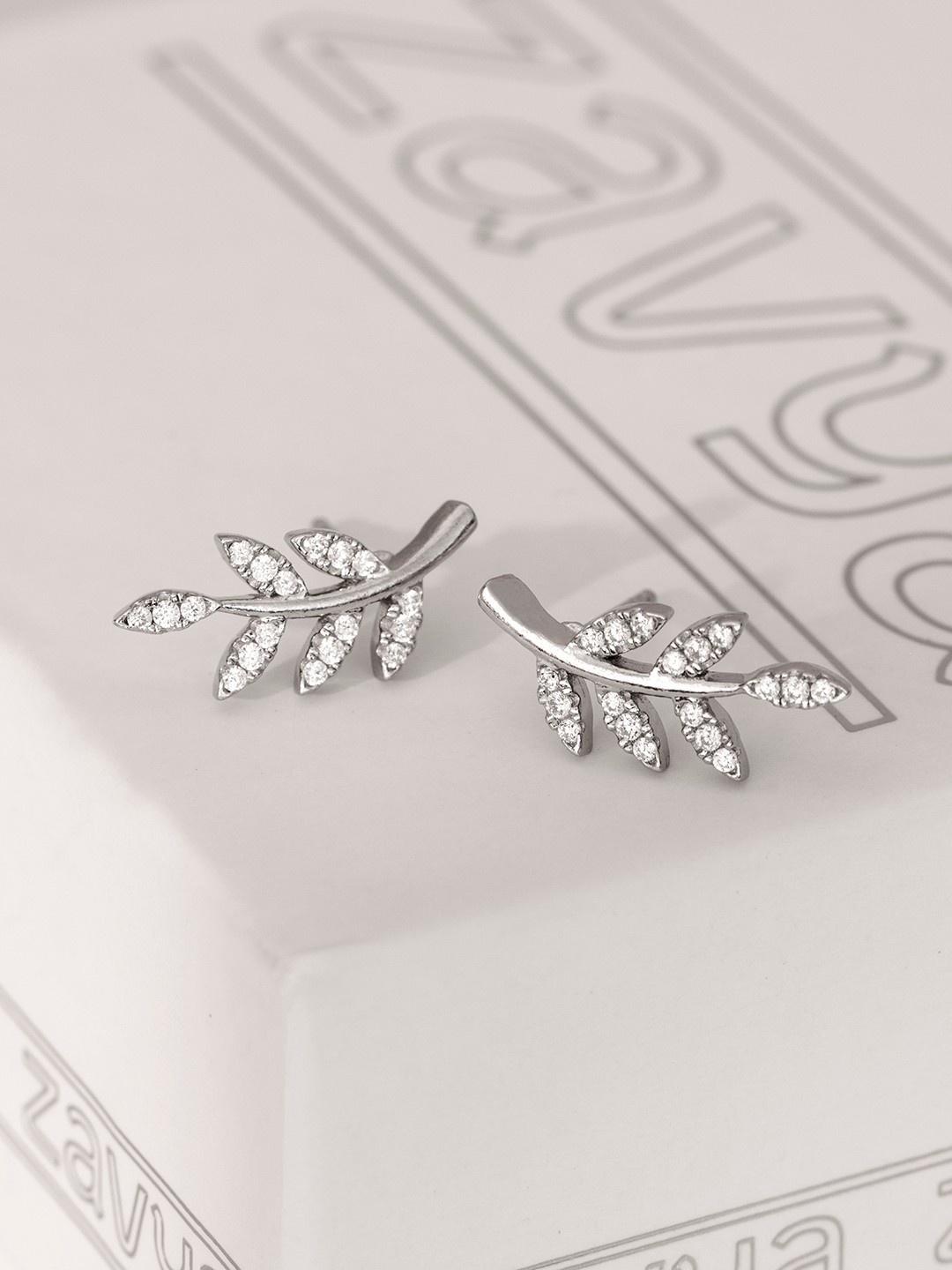 

Zavya Silver-Toned CZ Studded Leaf Shaped Studs Earrings