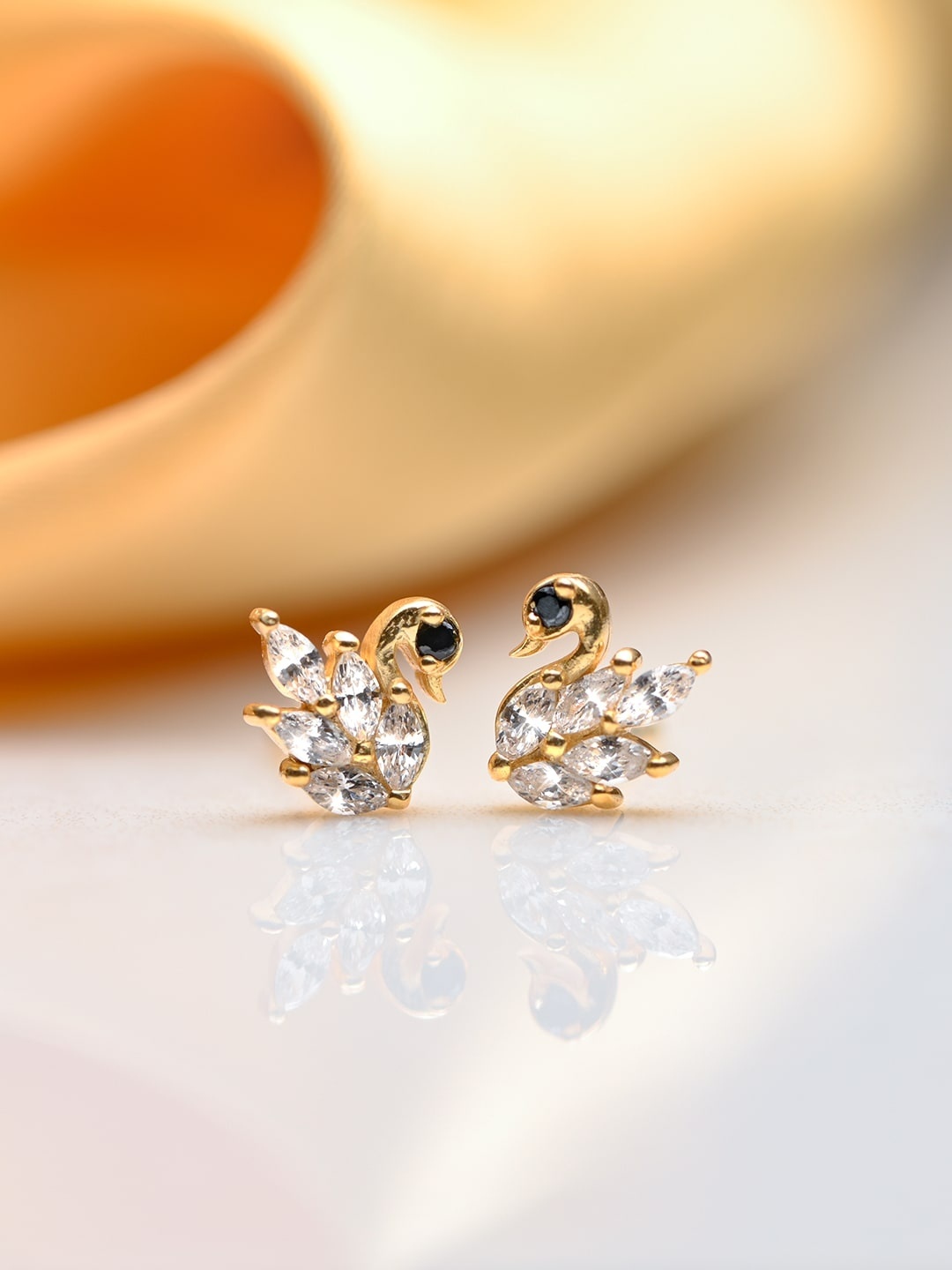 

Zavya Gold-Toned Animal Shaped CZ Studded Studs Earrings