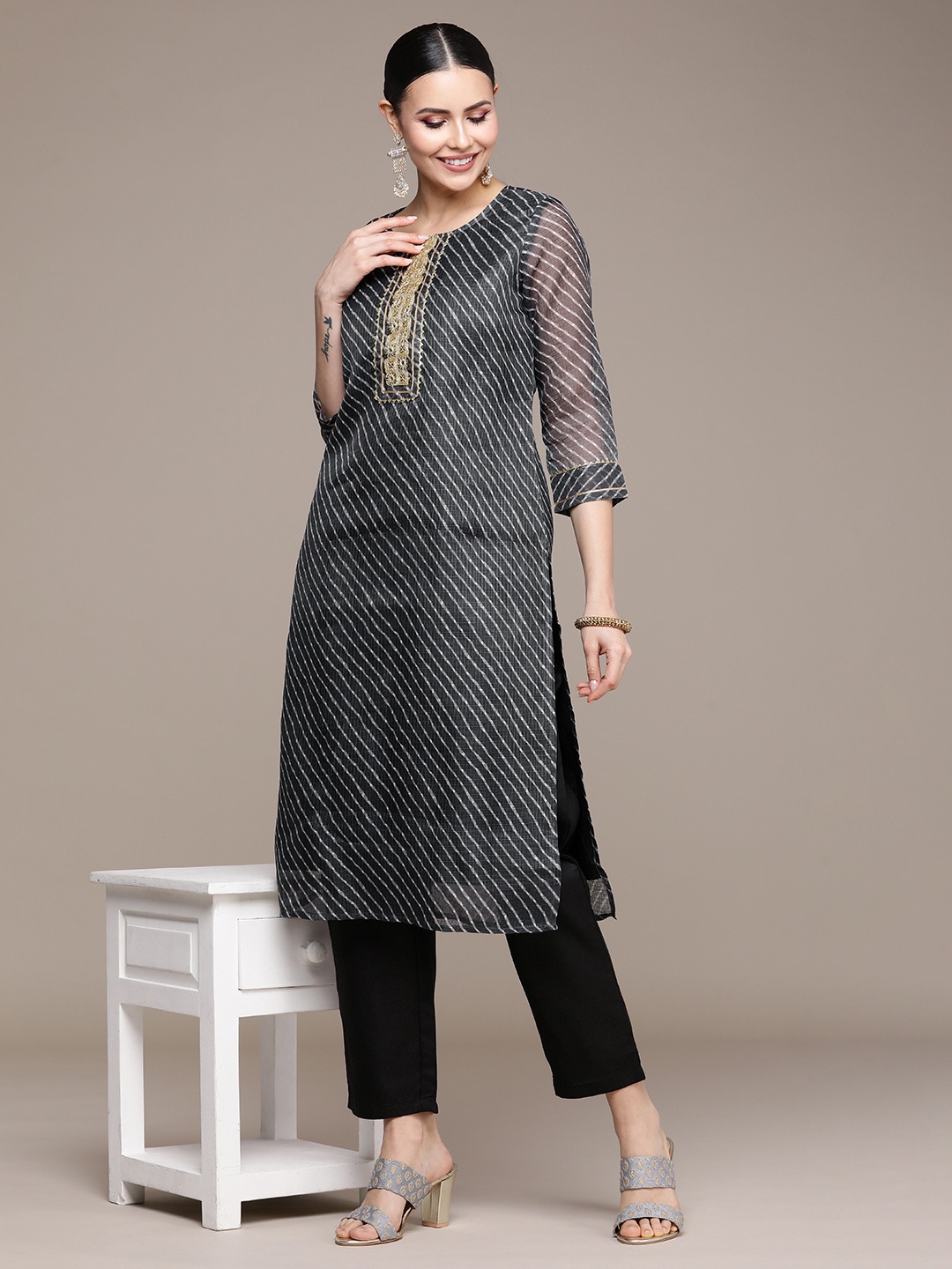 

Anouk Women Black Striped Regular Sequinned Kurta with Trousers