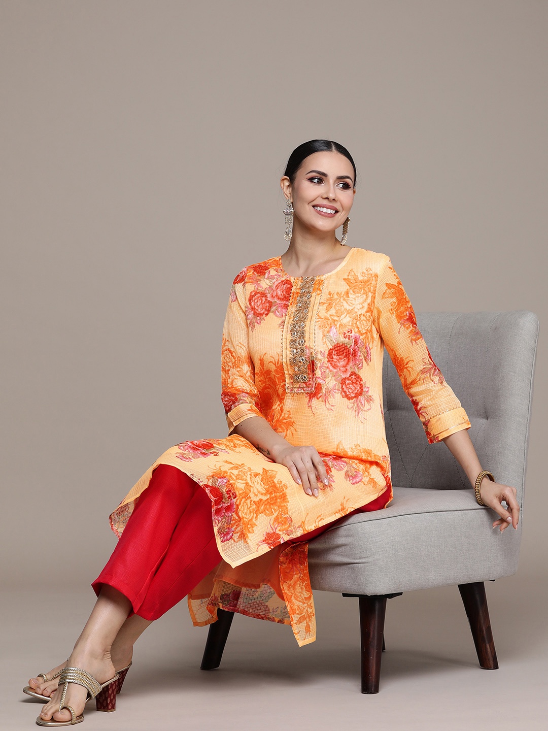 

Anouk Women Yellow Floral Printed Regular Sequinned Kurta with Trousers