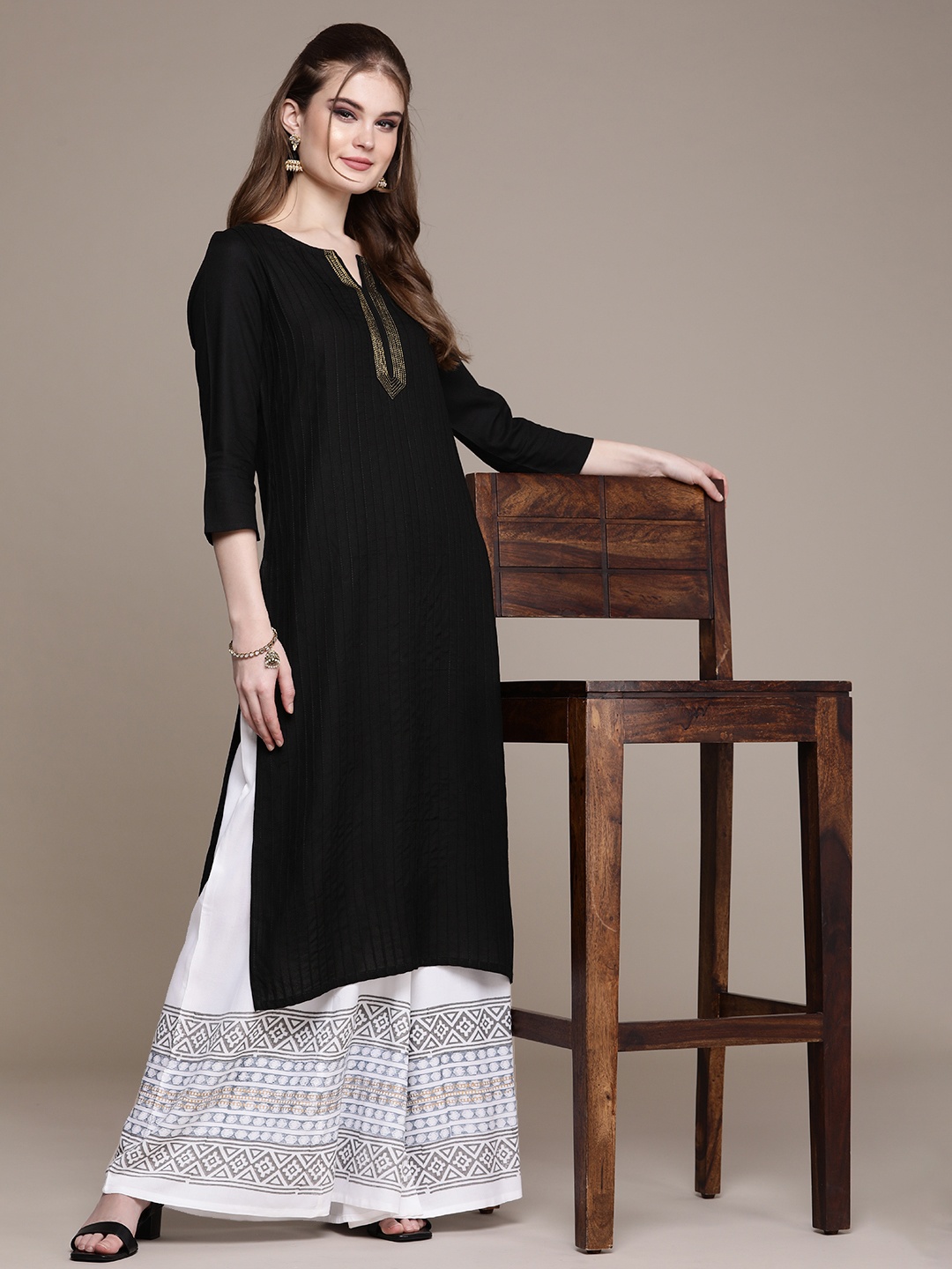 

Anouk Women Black Striped Regular Kurta with Trousers