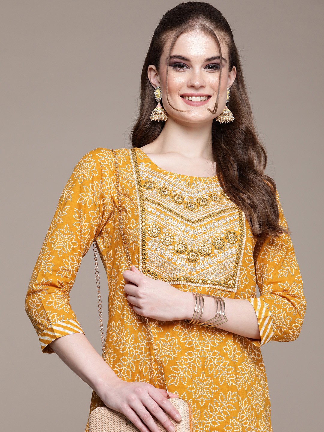 

Anouk Women Mustard Yellow Bandhani Embroidered Regular Mirror Work Pure Cotton Kurta with Trousers