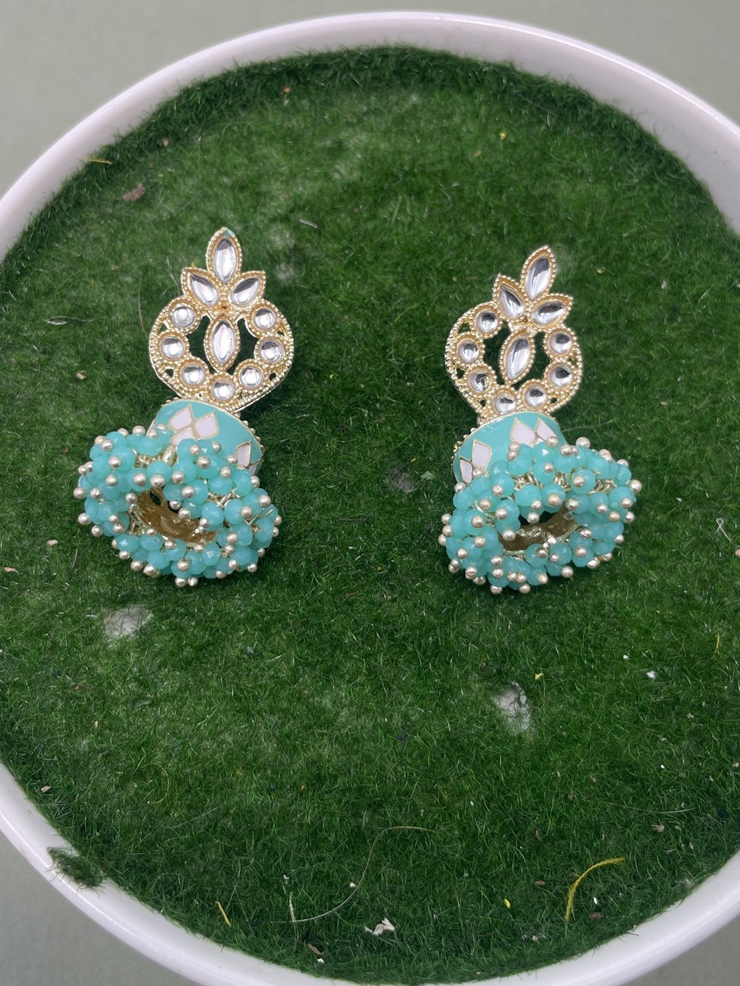 

Rhymee Gold-Plated Kundan Studded Jhumkas
