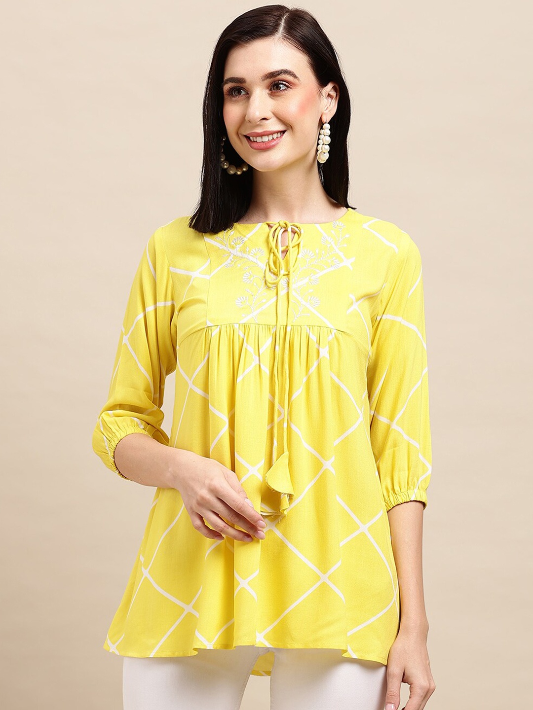 

Sangria Yellow Geometric Printed & Embroidered Tie-Up Neck A-Line Top