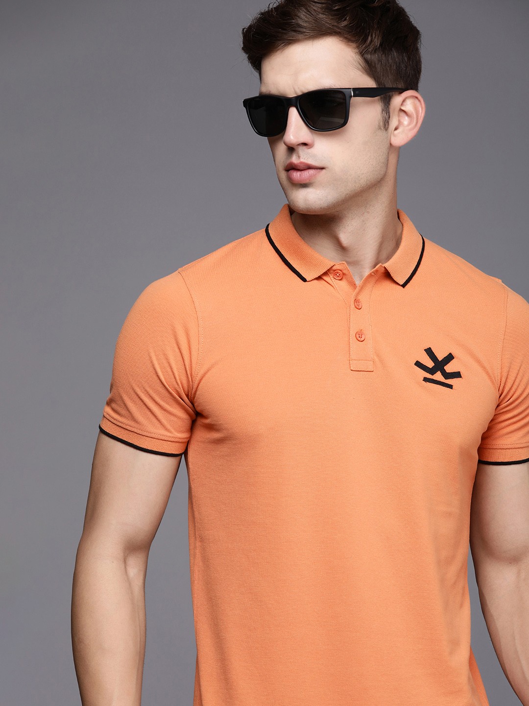 

WROGN Men Solid Polo Collar T-shirt, Orange