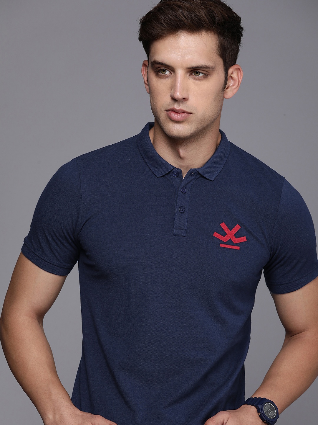 

WROGN Men Solid Polo Collar Indigo Slim Fit T-shirt With Brand Logo Embroidered Detail, Navy blue