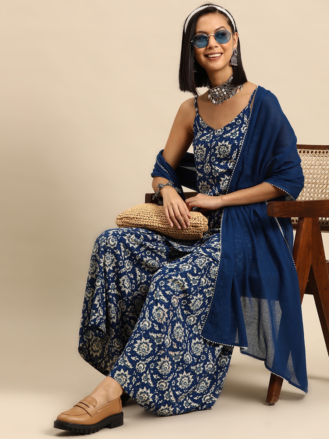 

Sangria Women Floral Printed Kurta with Sharara & Dupatta, Navy blue