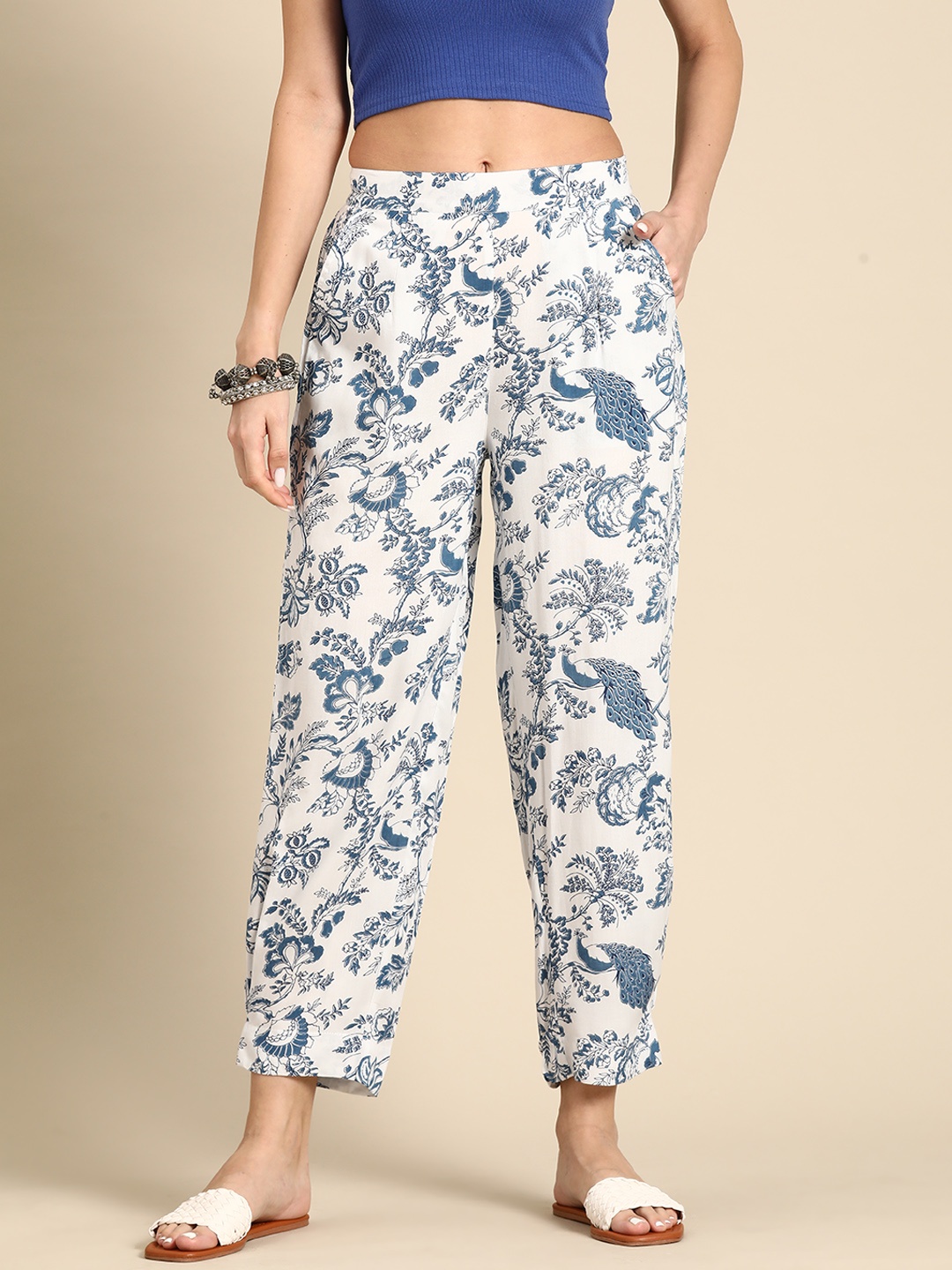 

Sangria Women Floral Printed Regular Fit Trousers, White
