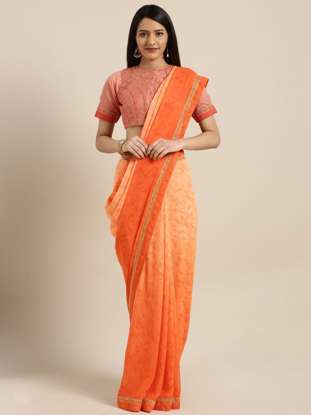 

Shaily Orange & Gold-Toned Embroidered Pure Georgette Saree