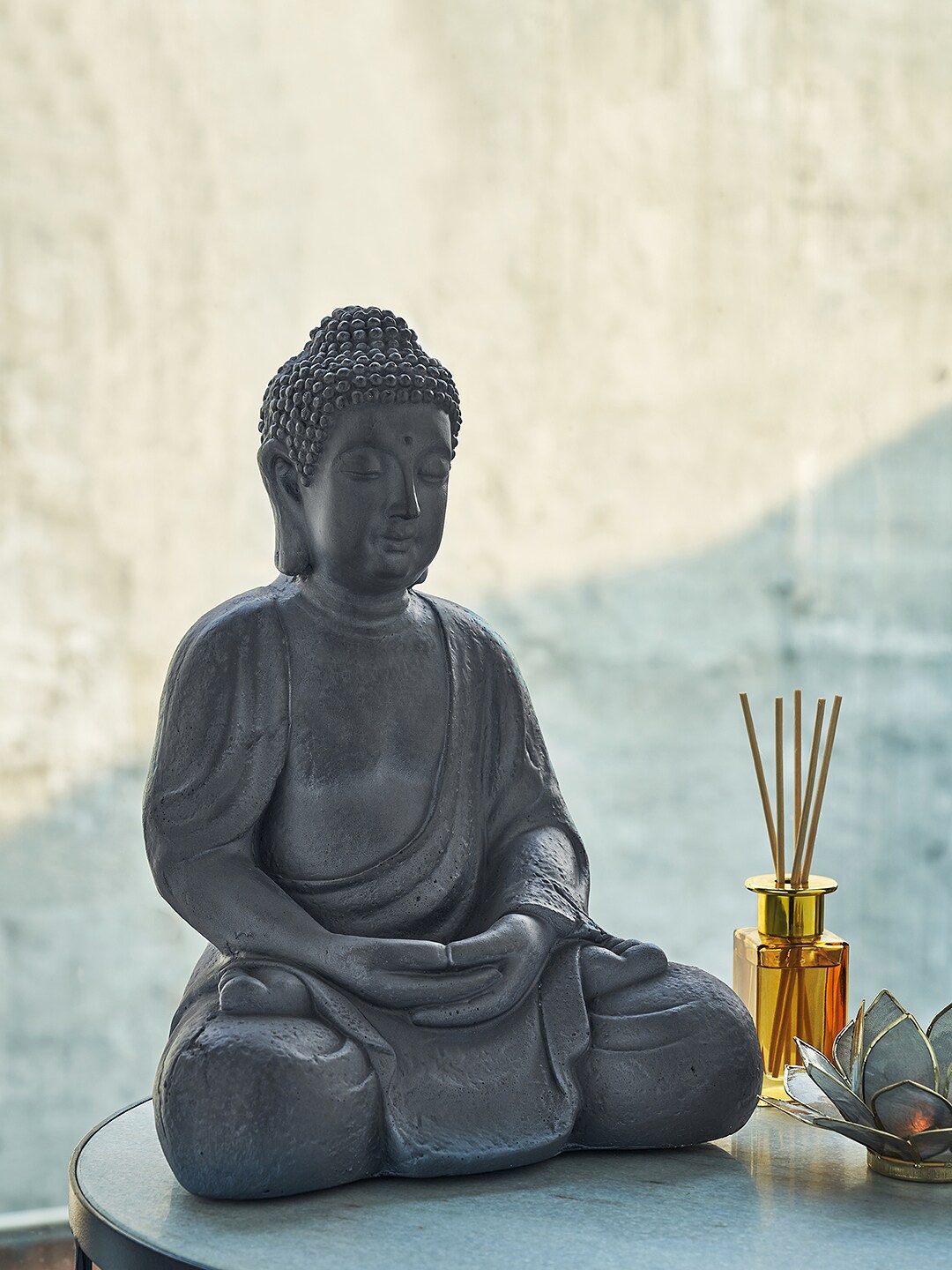 

Pure Home and Living Grey Sitting Buddha Showpiece