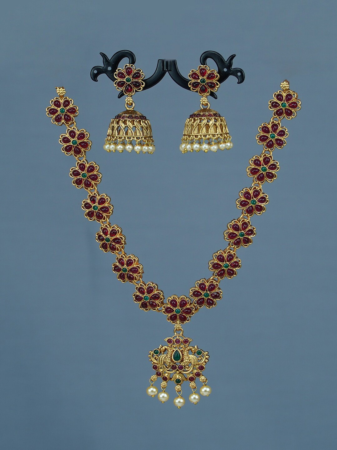 

Diksha collection Gold-Plated Stone-Studded Jewellery Set