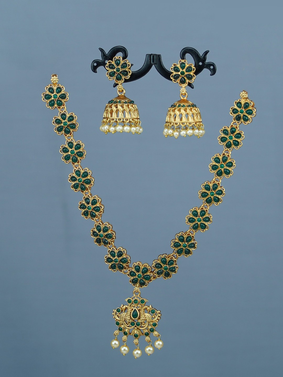 

Diksha collection Gold-Plated Stone-Studded Jewellery Set