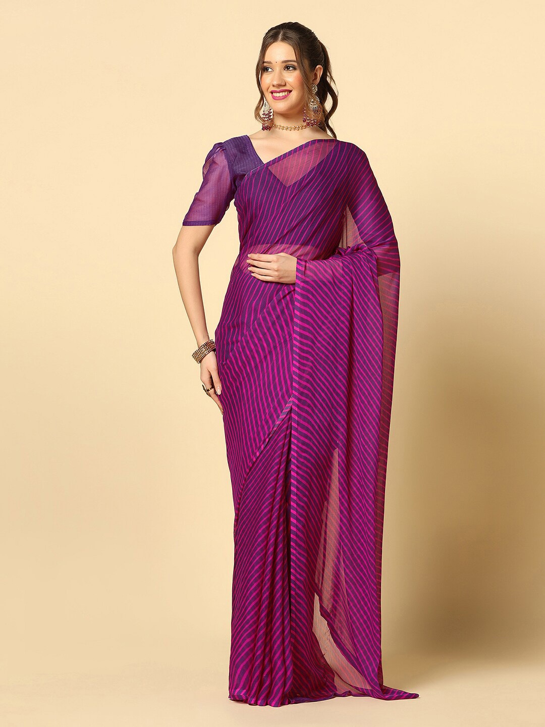 

Mitera Purple & Pink Leheriya Printed Saree