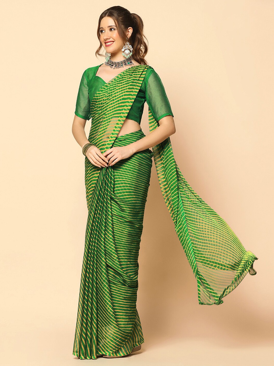 

Mitera Green & Yellow Leheriya Printed Saree