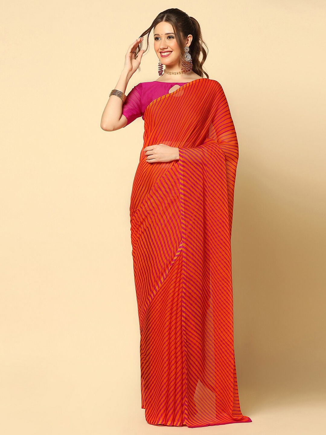 

Mitera Orange & Pink Leheriya Printed Saree