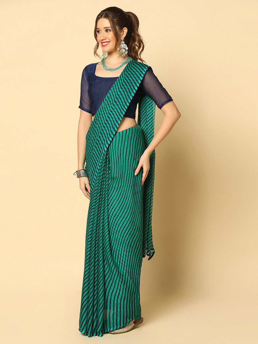 

Mitera Green & Black Leheriya Printed Saree