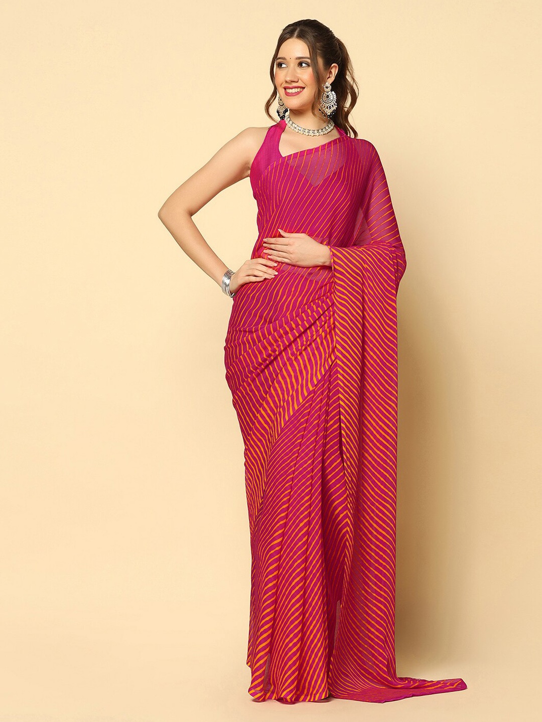 

Mitera Pink & Yellow Leheriya Printed Saree