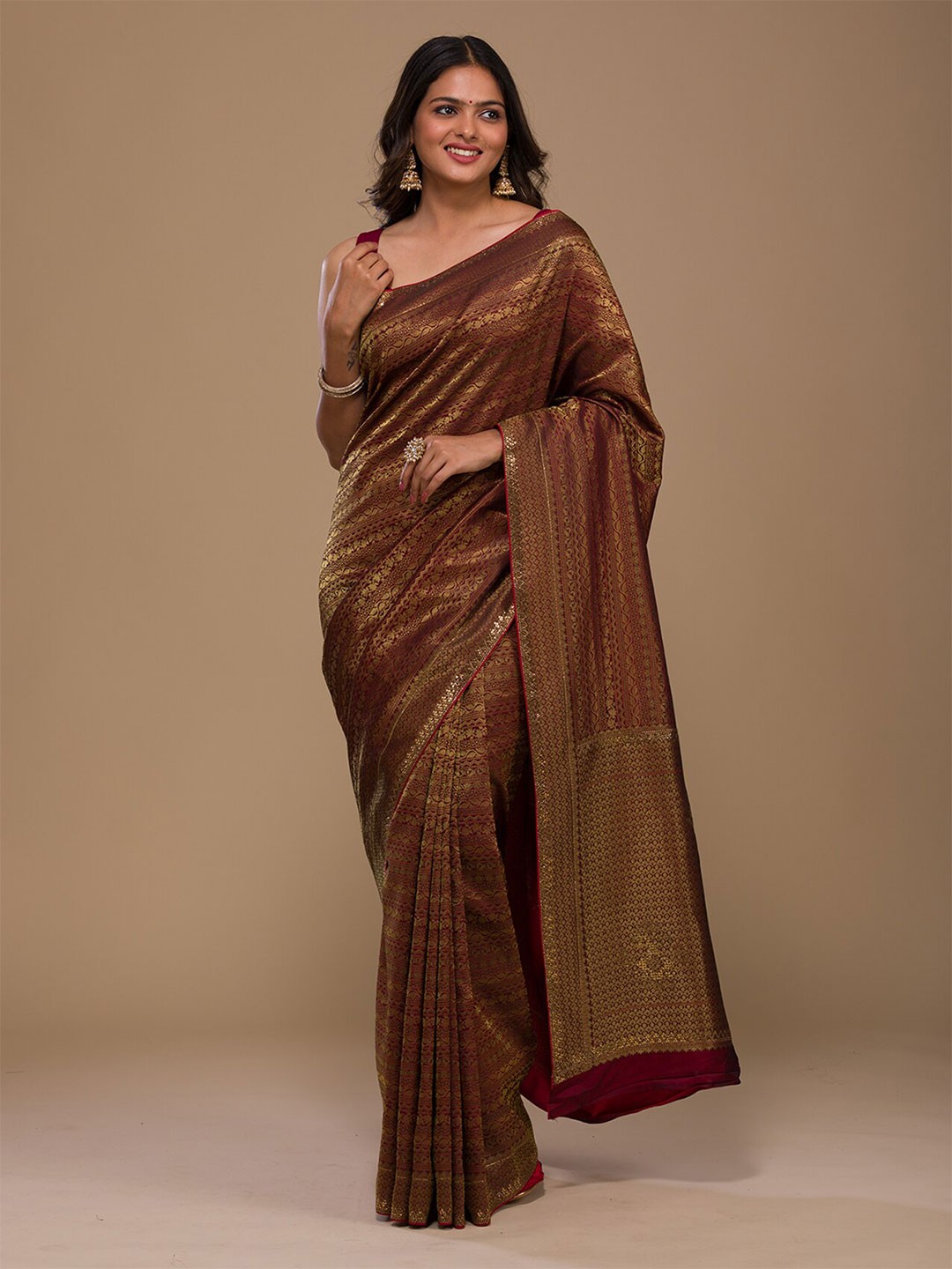 

Koskii Ethnic Motif Woven Design Sequinned Zari Banarasi Saree, Maroon