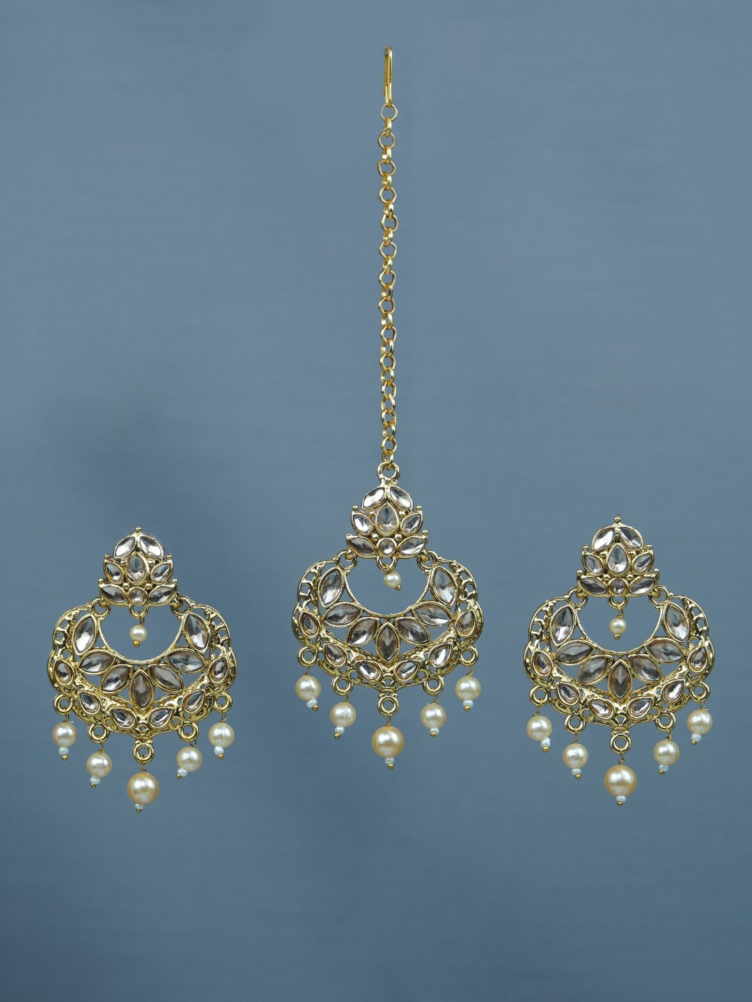 

Diksha collection Gold-Plated Kundan & Stone-Studded Jewelery Set