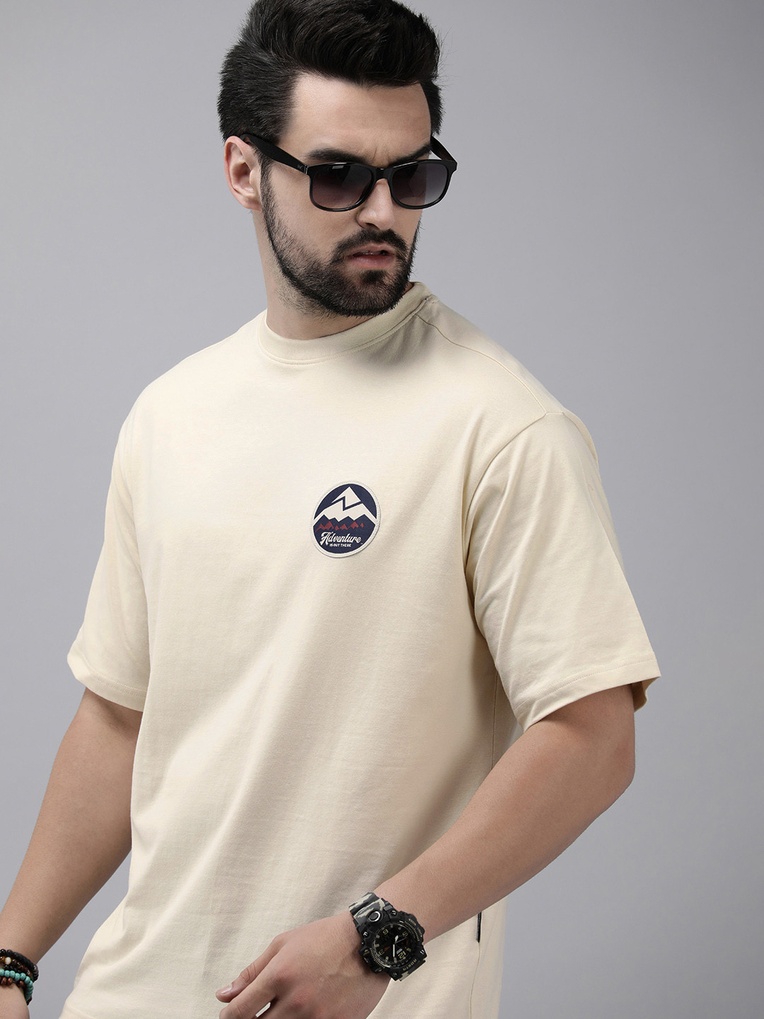 

Roadster Men Drop-Shoulder Sleeves Pure Cotton Oversize T-shirt, Beige