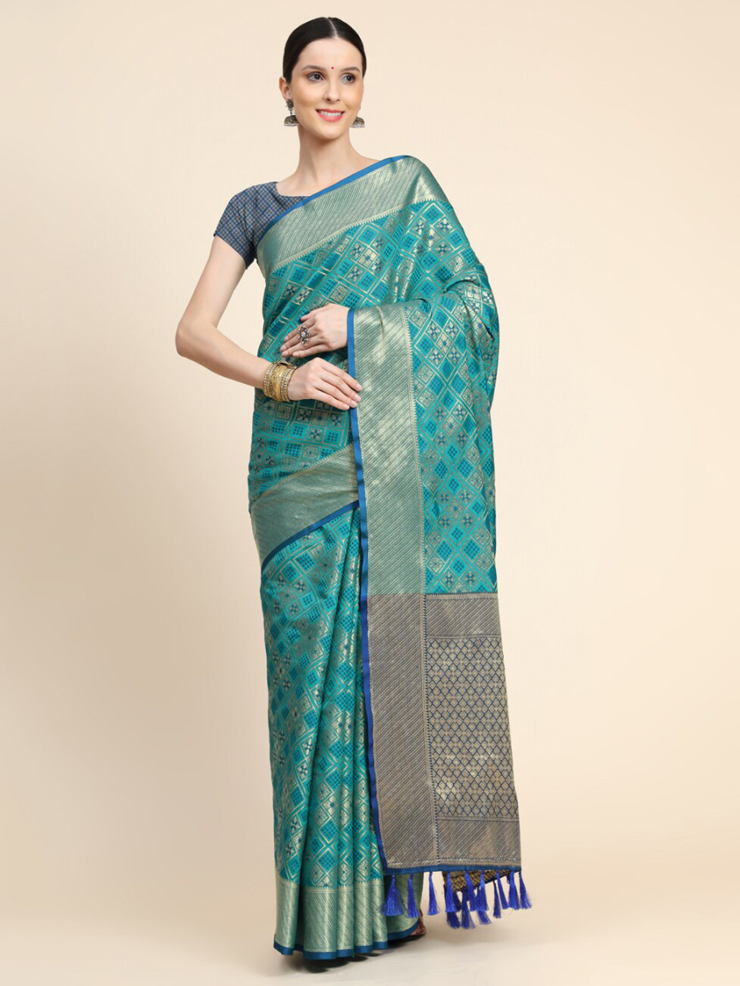 

Tasarika Ethnic Motif Woven Design Zari Patola Saree, Turquoise blue