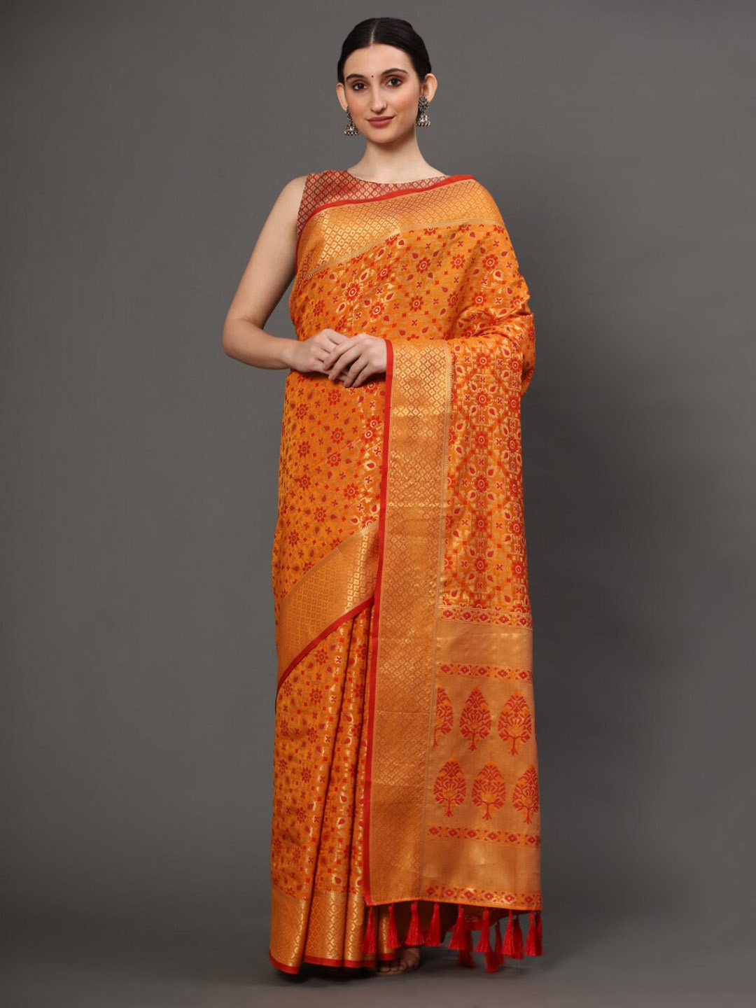 

Tasarika Floral Woven Design Zari Patola Saree, Mustard