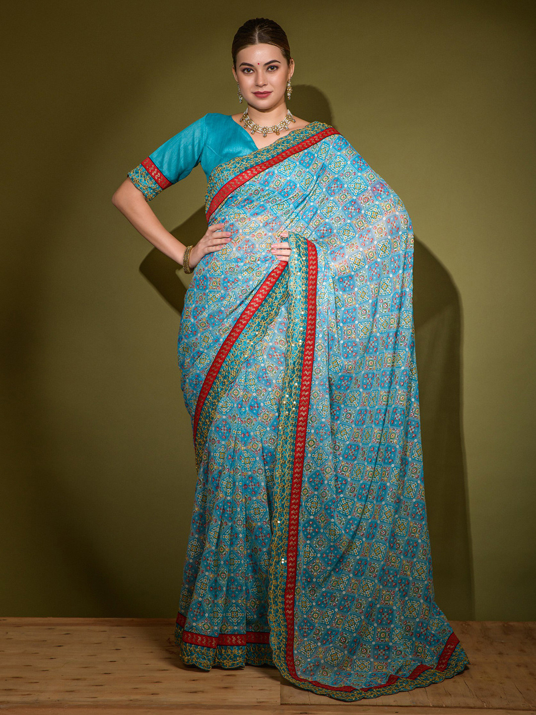 

VEERAX Ethnic Motifs Printed Embroidered Pure Georgette Saree, Blue