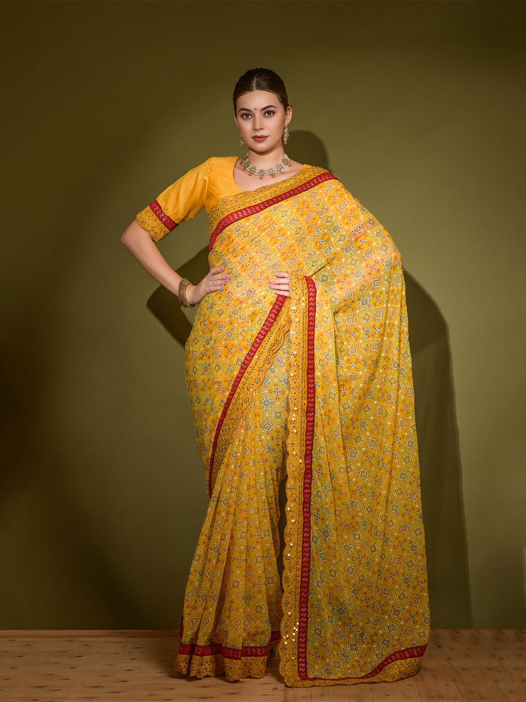 

VEERAX Ethnic Motifs Printed Embroidered Pure Georgette Saree, Yellow