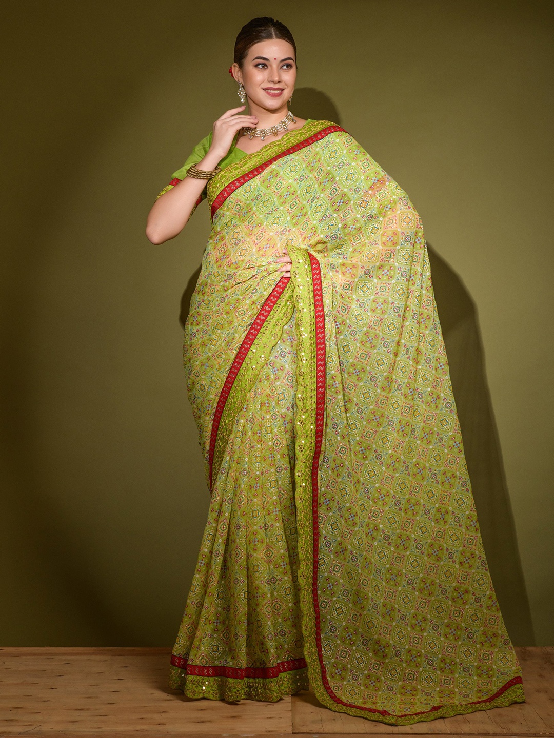 

VEERAX Ethnic Motifs Printed Embroidered Pure Georgette Saree, Green