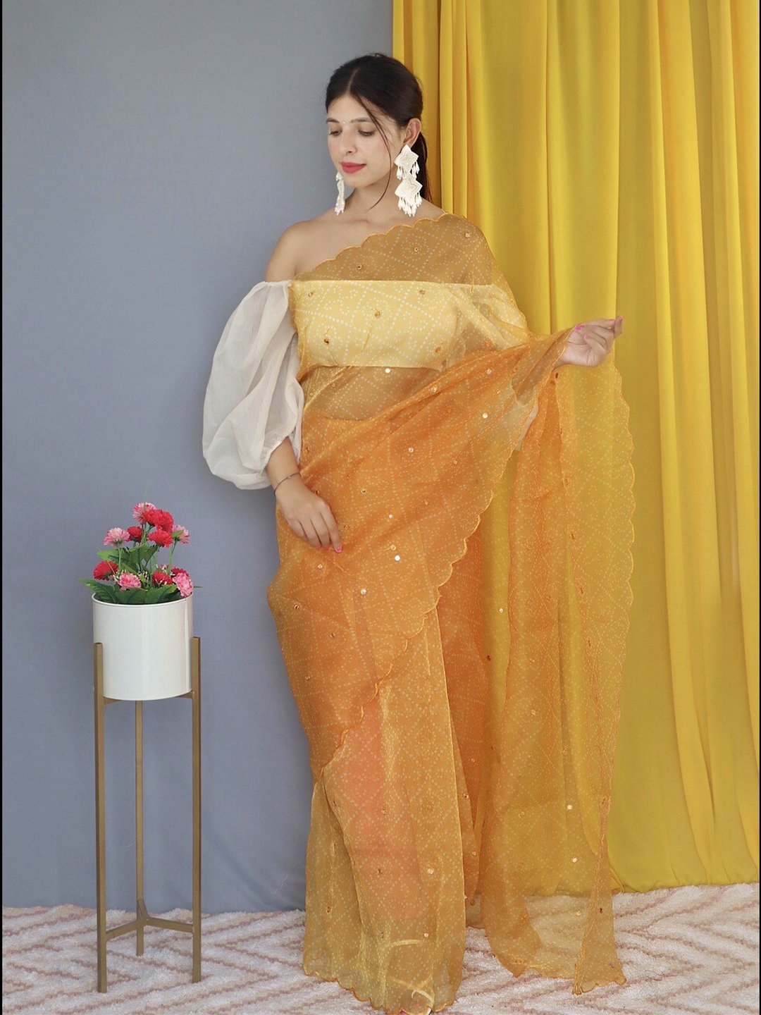 

Atulyam Tex World Bandhani Printed Mirror Work Organza Bandhani Saree, Yellow