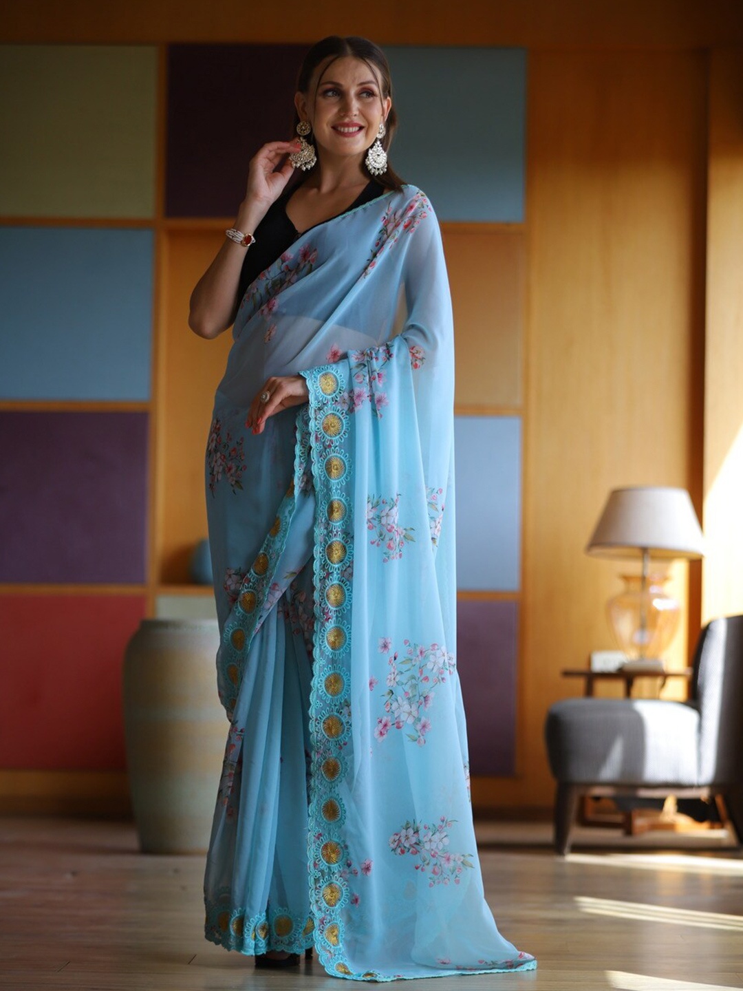 

Atulyam Tex World Floral Embroidered Pure Georgette Saree, Turquoise blue