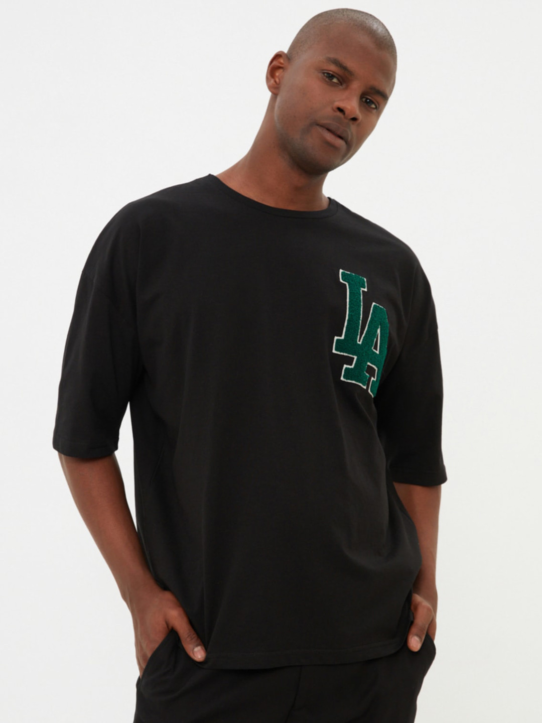 

Trendyol Typography Printed Drop-Shoulder Sleeves Pure Cotton T-shirt, Black