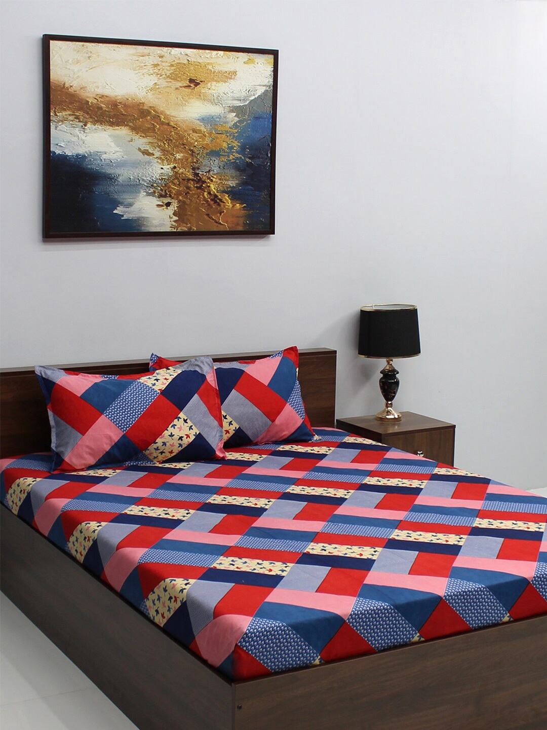 

BOMBAY DYEING Vista Blue & Red Printed 144 TC Queen Bedsheet & 2 Pillow Covers
