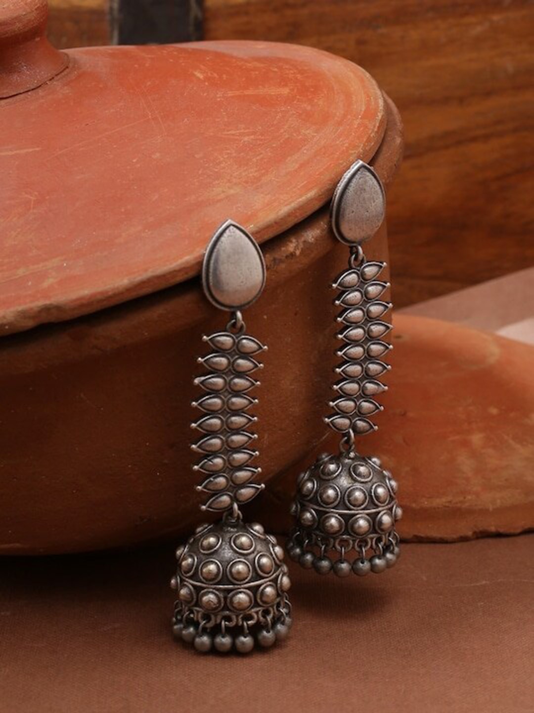 

Infuzze Silver-Plated Contemporary Jhumkas Earrings