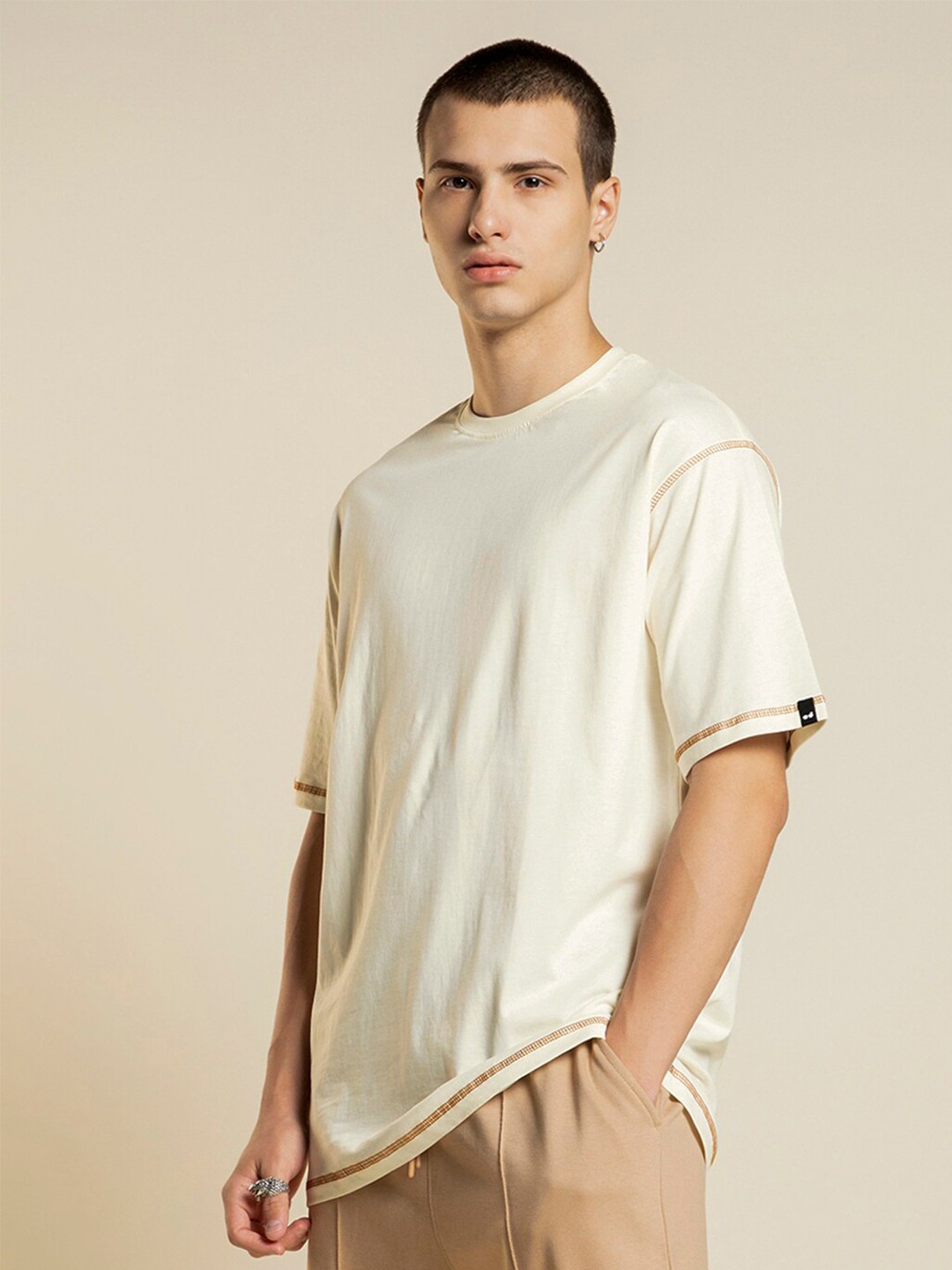 

Bewakoof Solid Drop-Shoulder Sleeves Oversized T-shirt, Pink