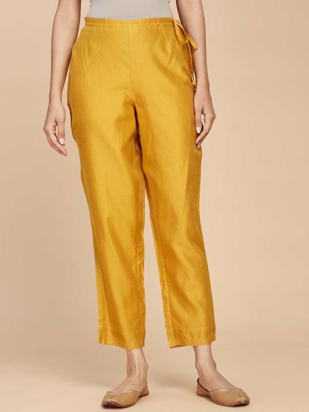 

Fabindia Women Mid Rise Plain Cotton Silk Cropped Trousers, Mustard