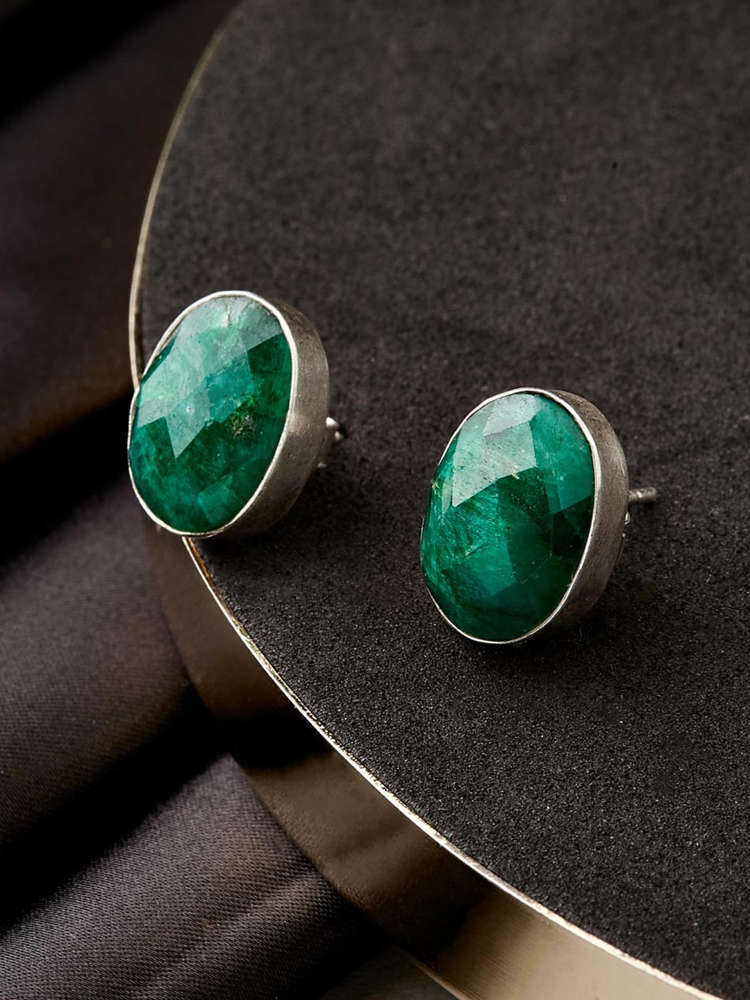 

Fabindia Silver Oval Studs Earrings