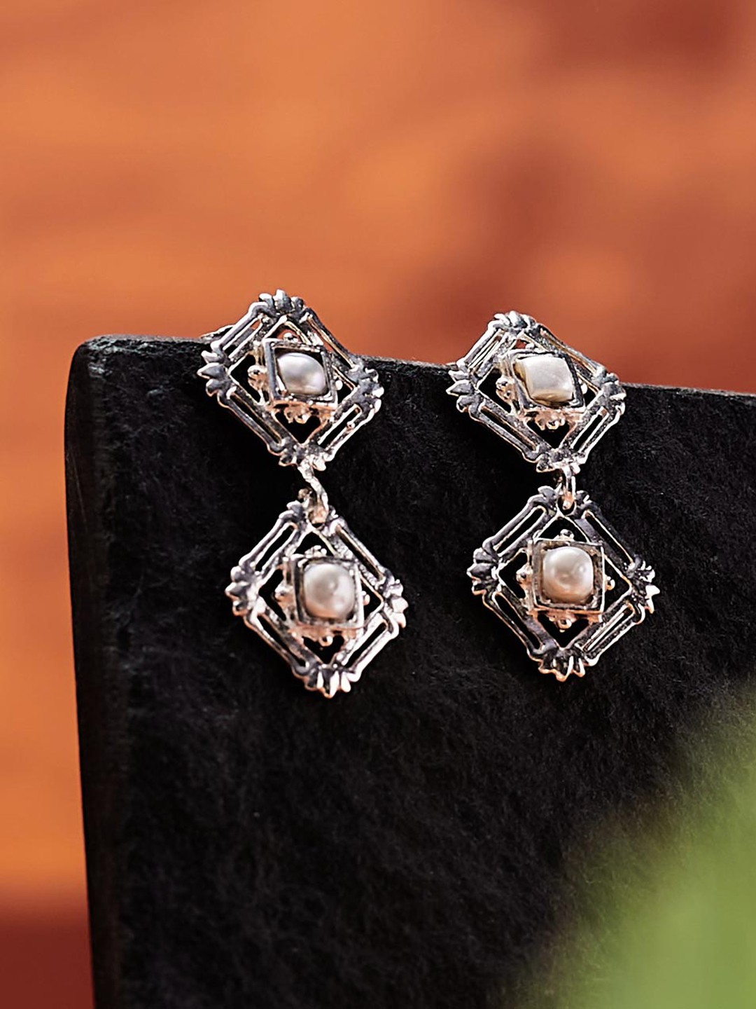 

Fabindia Silver Pearl Studded Contemporary Studs Earrings